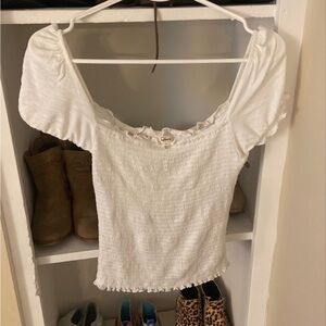 Size small gently worn off white Off the shoulder Takara textured baby doll top